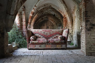 Lot 7 - A kilim-upholstered Knole sofa by George Smith