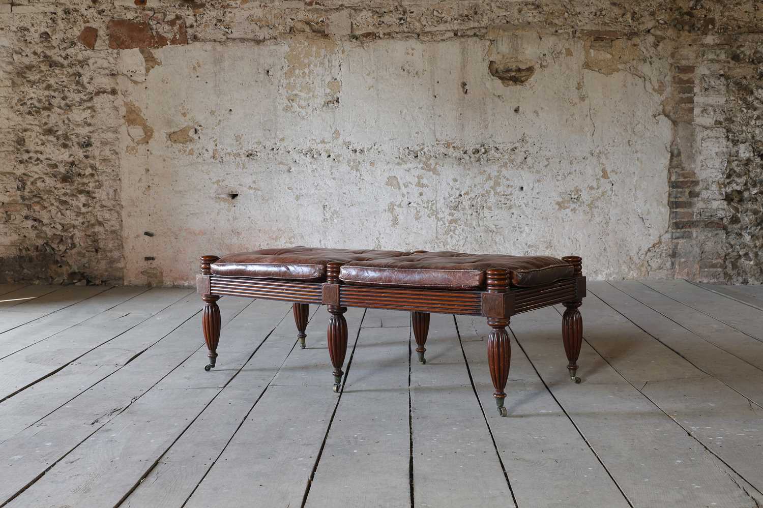 Lot 6 - A Regency-style mahogany and leather stool