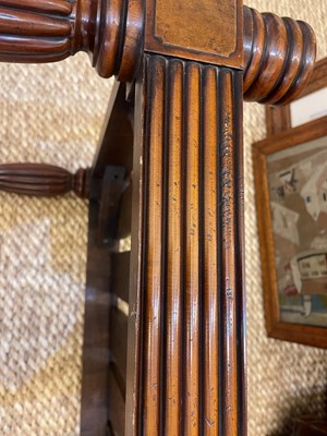 Lot 6 - A Regency-style mahogany and leather stool