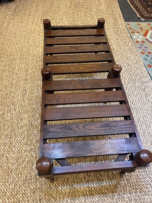Lot 6 - A Regency-style mahogany and leather stool