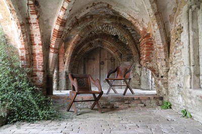 Lot 8 - A pair of carved oak Glastonbury chairs