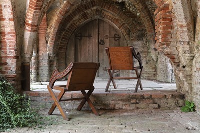 Lot 8 - A pair of carved oak Glastonbury chairs