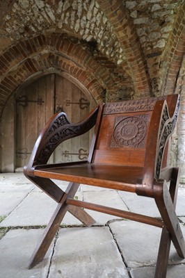 Lot 8 - A pair of carved oak Glastonbury chairs