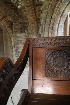 Lot 8 - A pair of carved oak Glastonbury chairs