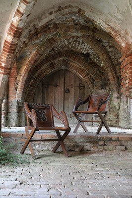 Lot 8 - A pair of carved oak Glastonbury chairs