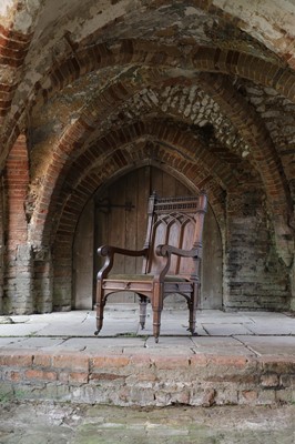 Lot 14 - A Victorian Gothic Revival oak armchair