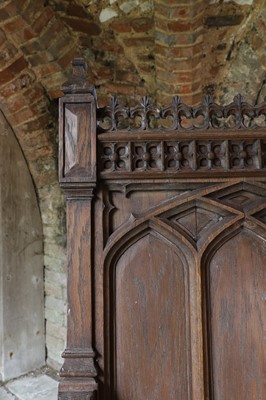 Lot 14 - A Victorian Gothic Revival oak armchair