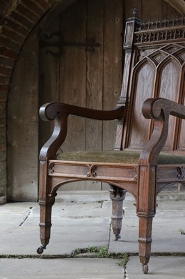Lot 14 - A Victorian Gothic Revival oak armchair