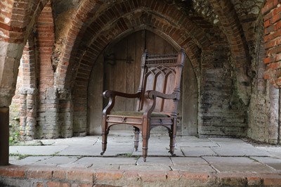 Lot 14 - A Victorian Gothic Revival oak armchair