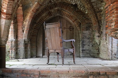 Lot 14 - A Victorian Gothic Revival oak armchair
