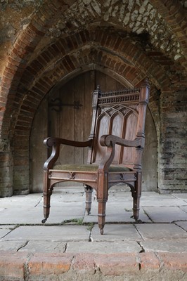 Lot 14 - A Victorian Gothic Revival oak armchair