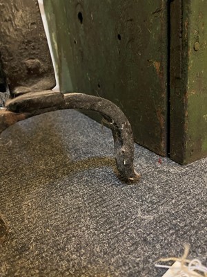 Lot 22 - A cast iron and brass fireguard