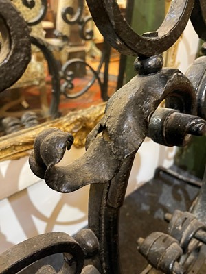 Lot 22 - A cast iron and brass fireguard