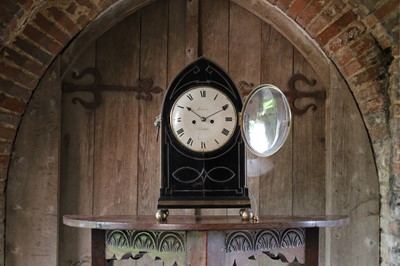Lot 3 - A Regency ebonised table clock