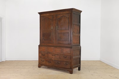 Lot 13 - A George III provincial oak linen press