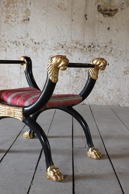 Lot 11 - A Regency-style ebonised stool
