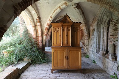 Lot 17 - A Victorian golden oak cupboard