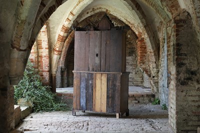 Lot 17 - A Victorian golden oak cupboard
