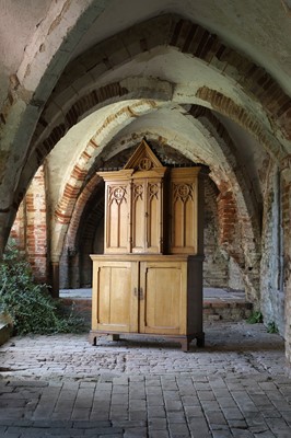 Lot 17 - A Victorian golden oak cupboard