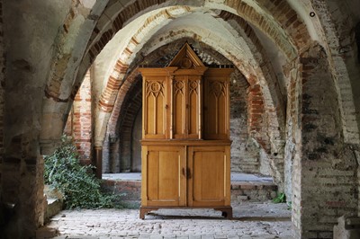 Lot 17 - A Victorian golden oak cupboard