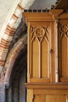 Lot 17 - A Victorian golden oak cupboard