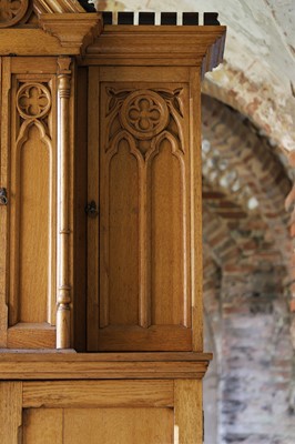 Lot 17 - A Victorian golden oak cupboard