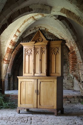 Lot 17 - A Victorian golden oak cupboard