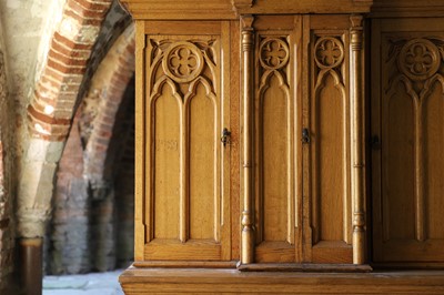 Lot 17 - A Victorian golden oak cupboard