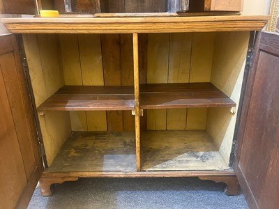 Lot 17 - A Victorian golden oak cupboard