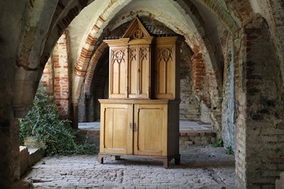 Lot 17 - A Victorian golden oak cupboard