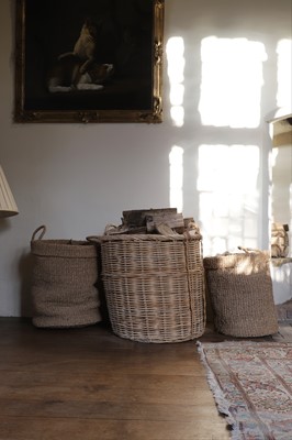 Lot 24 - A group of three log or storage baskets