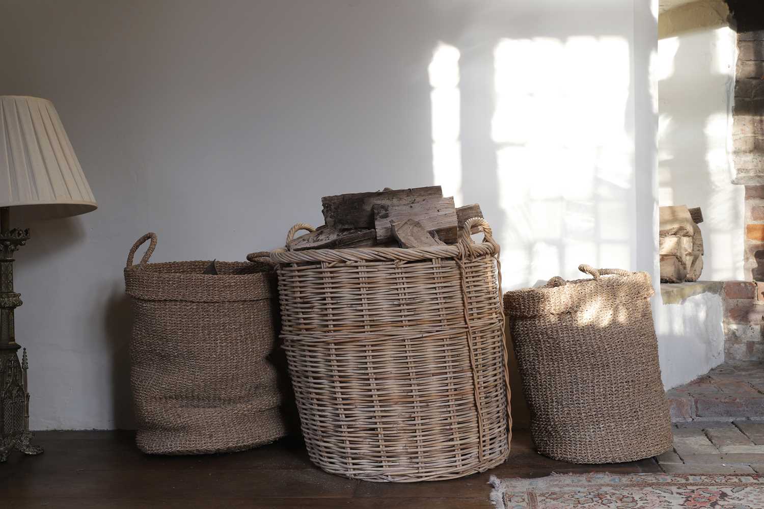 Lot 24 - A group of three log or storage baskets
