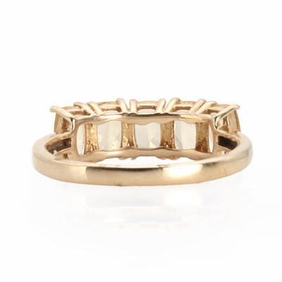 Lot 1140 - A 9ct gold five stone topaz ring