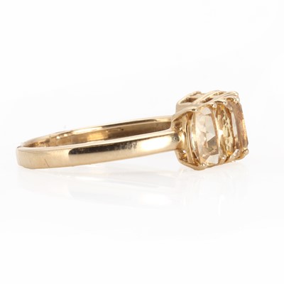 Lot 1140 - A 9ct gold five stone topaz ring