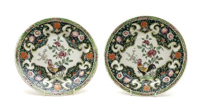 Lot 142 - A pair of Chinese export famille noir plates
