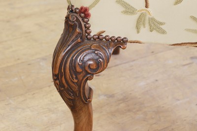 Lot 52 - A pair of George II-style walnut armchairs