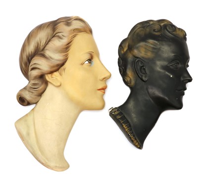 Lot 70 - Two Art Deco painted plaster wall masks