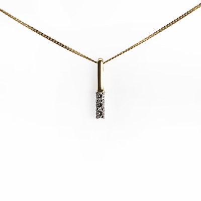 Lot 1049 - An 18ct gold diamond necklace and earring suite