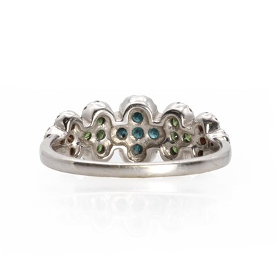 Lot 1090 - A 9ct white gold coloured diamond cluster ring