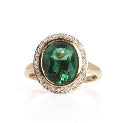 Lot 1145 - A 9ct gold oval cluster ring