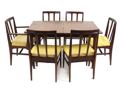 Lot 454 - An Afromosia dining suite