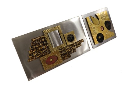 Lot 250 - An abstract metal wall plaque