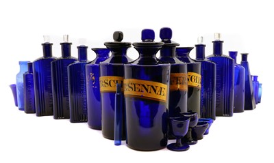 Lot 126 - A collection of glass apothecary jars