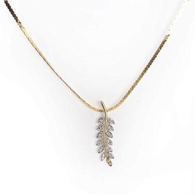 Lot 1052 - A two colour gold diamond leaf design pendant and chain