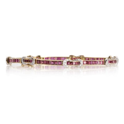 Lot 1127 - A gold ruby and diamond line bracelet
