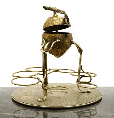 Lot 54 - A silver plated lemon squeezer