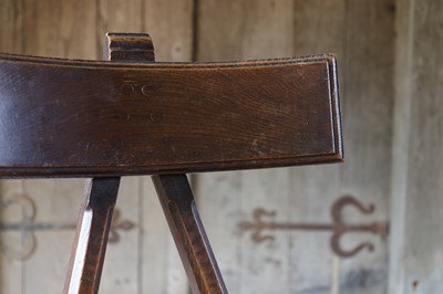 Lot 23 - A 'Granville' oak chair designed by E W Pugin