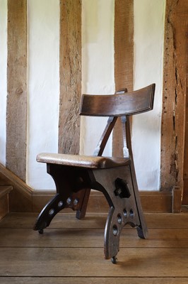 Lot 23 - A 'Granville' oak chair designed by E W Pugin