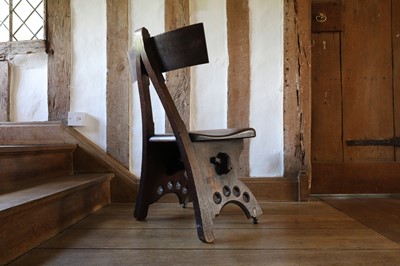 Lot 23 - A 'Granville' oak chair designed by E W Pugin