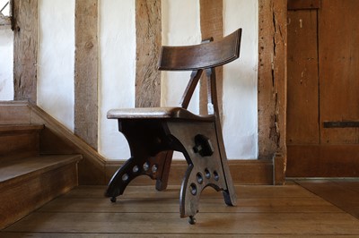 Lot 23 - A 'Granville' oak chair designed by E W Pugin